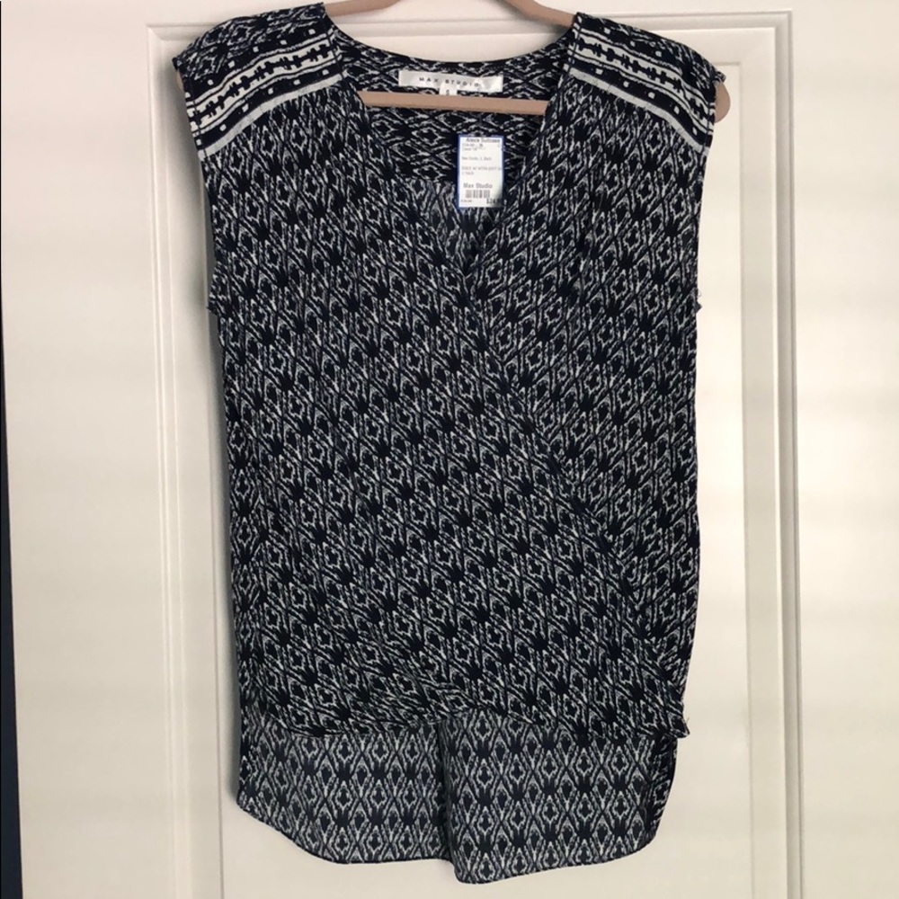 Sleeveless high/low top